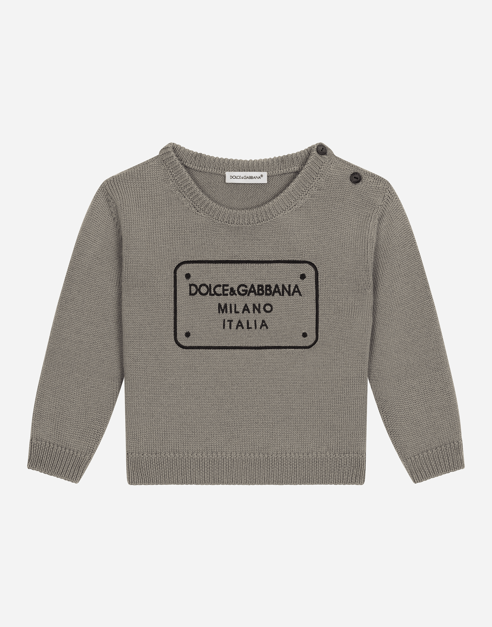 Knit pullover with logo tag