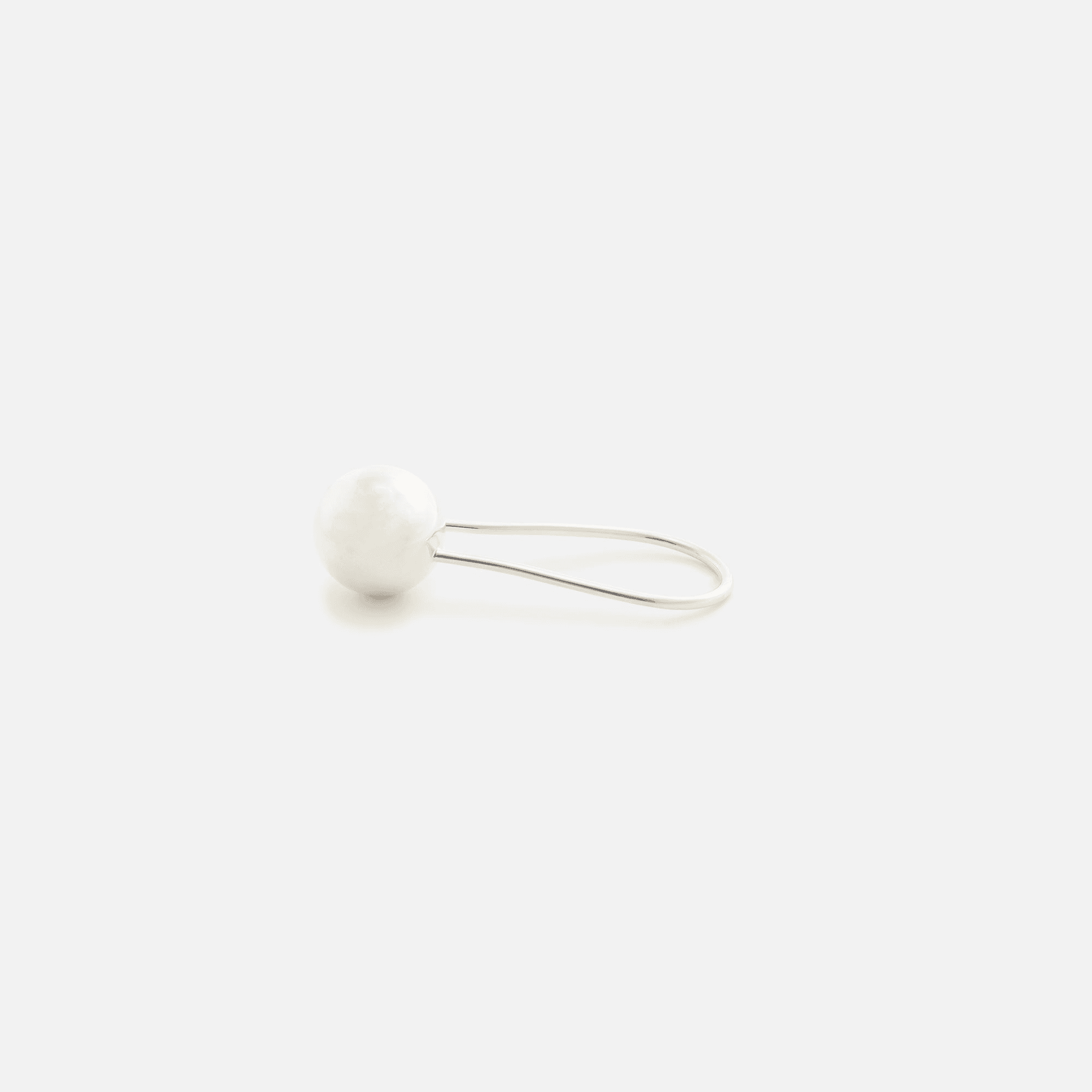 Areaware Harmony Ball Rattle - Elongated Silver - Image 1