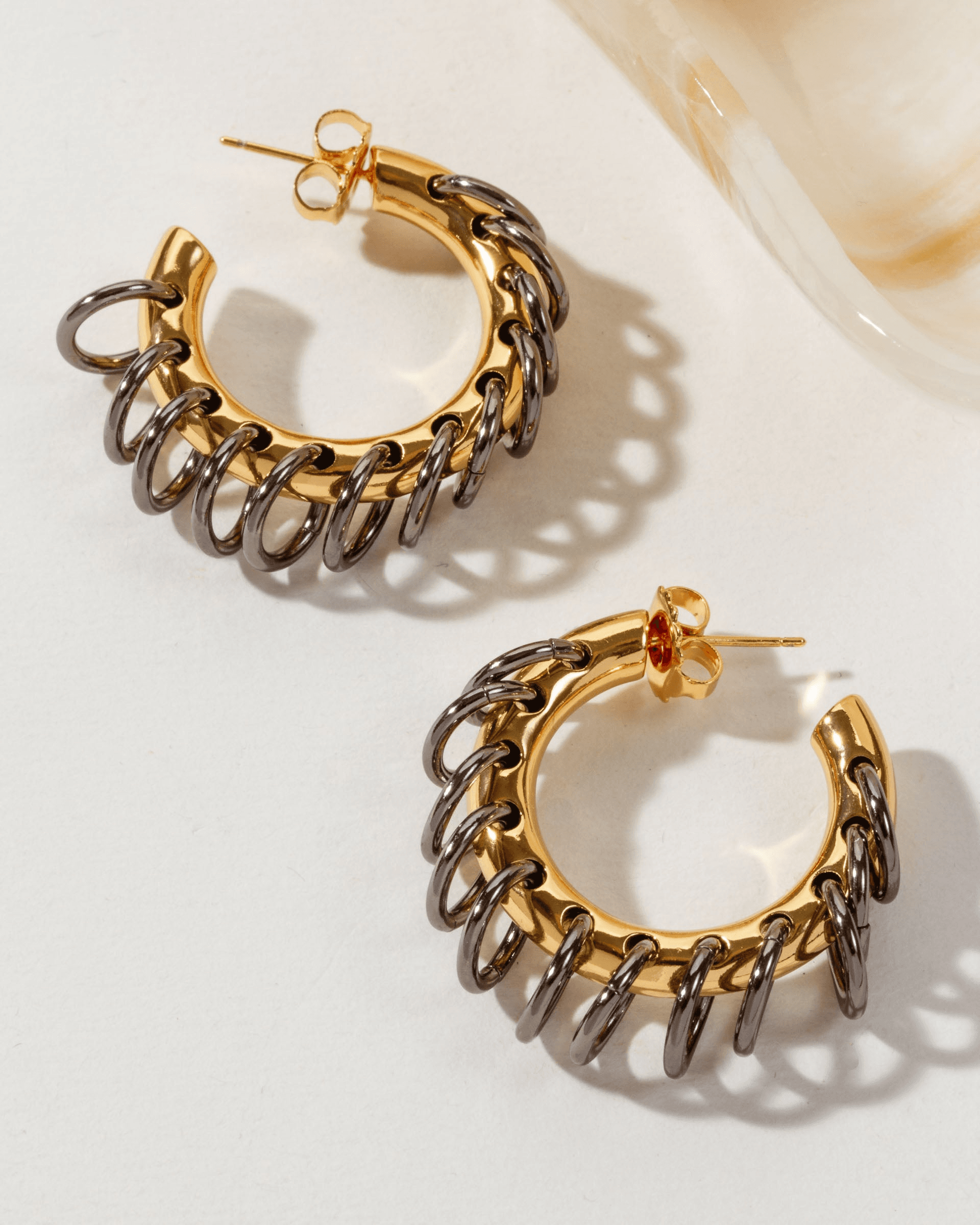 Golden Eclipse Vertebrae Post Hoop Earring - Image 1