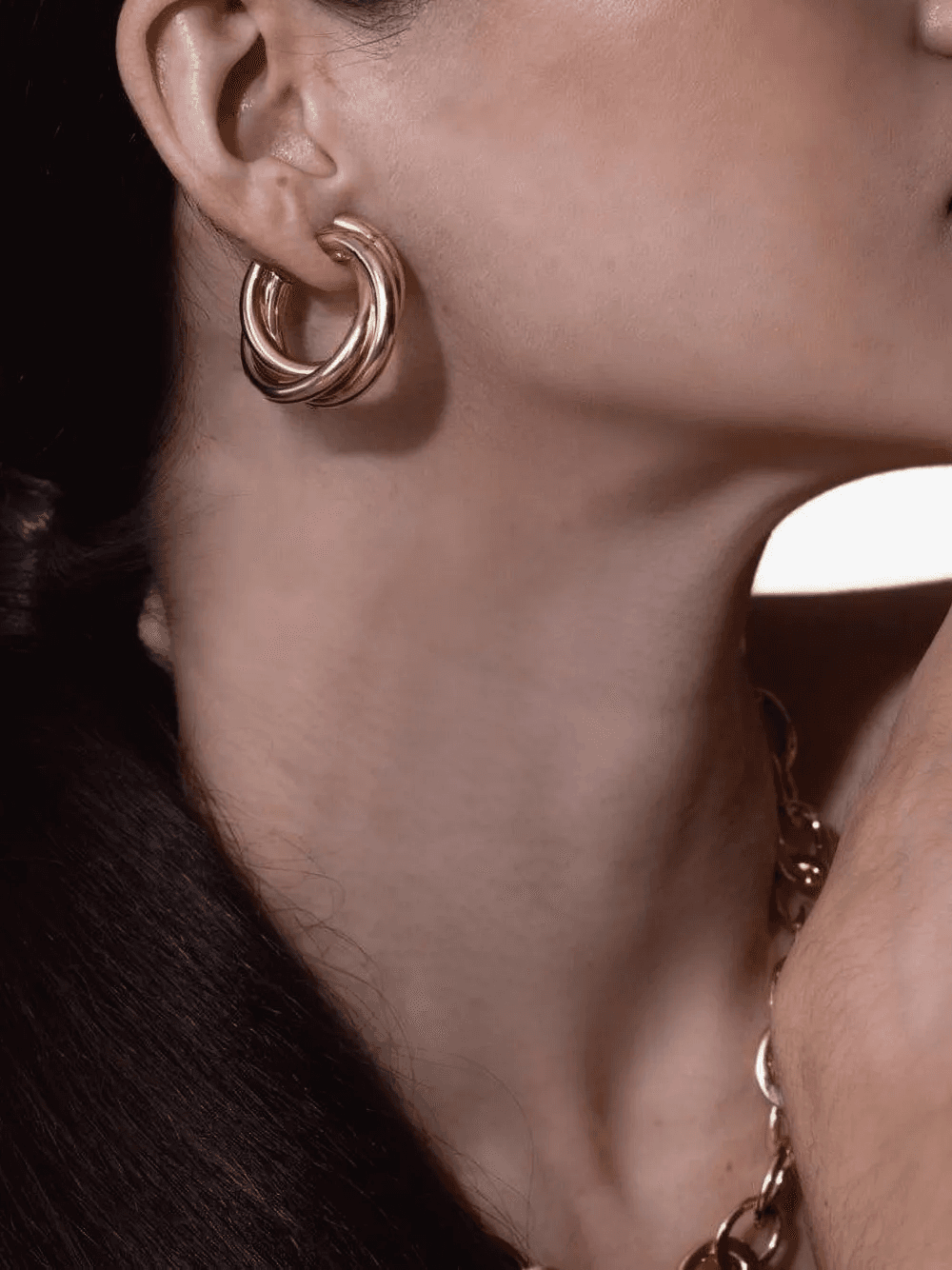 18K yellow gold Triple Intertwined hoop earrings - Image 1