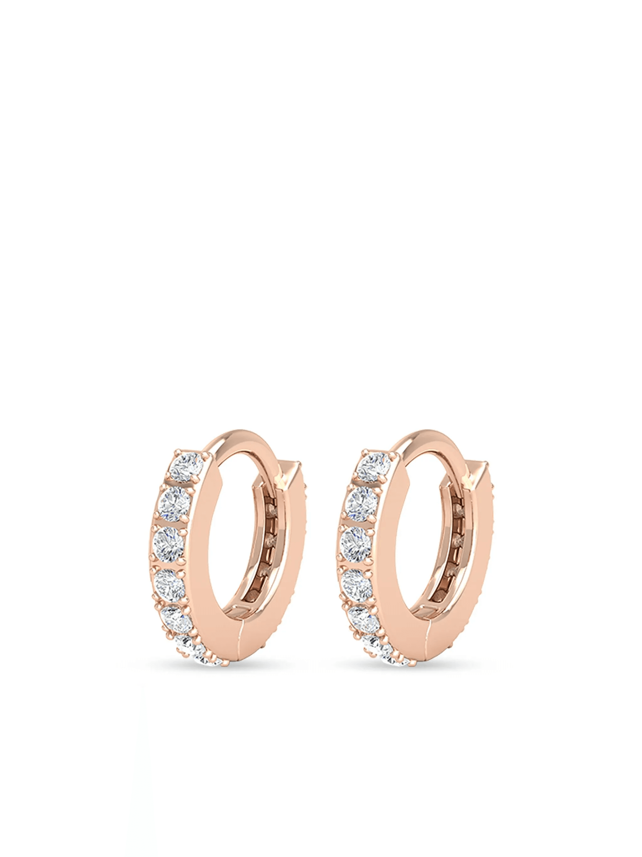 14kt rose gold mini huggie diamond earrings - Image 1