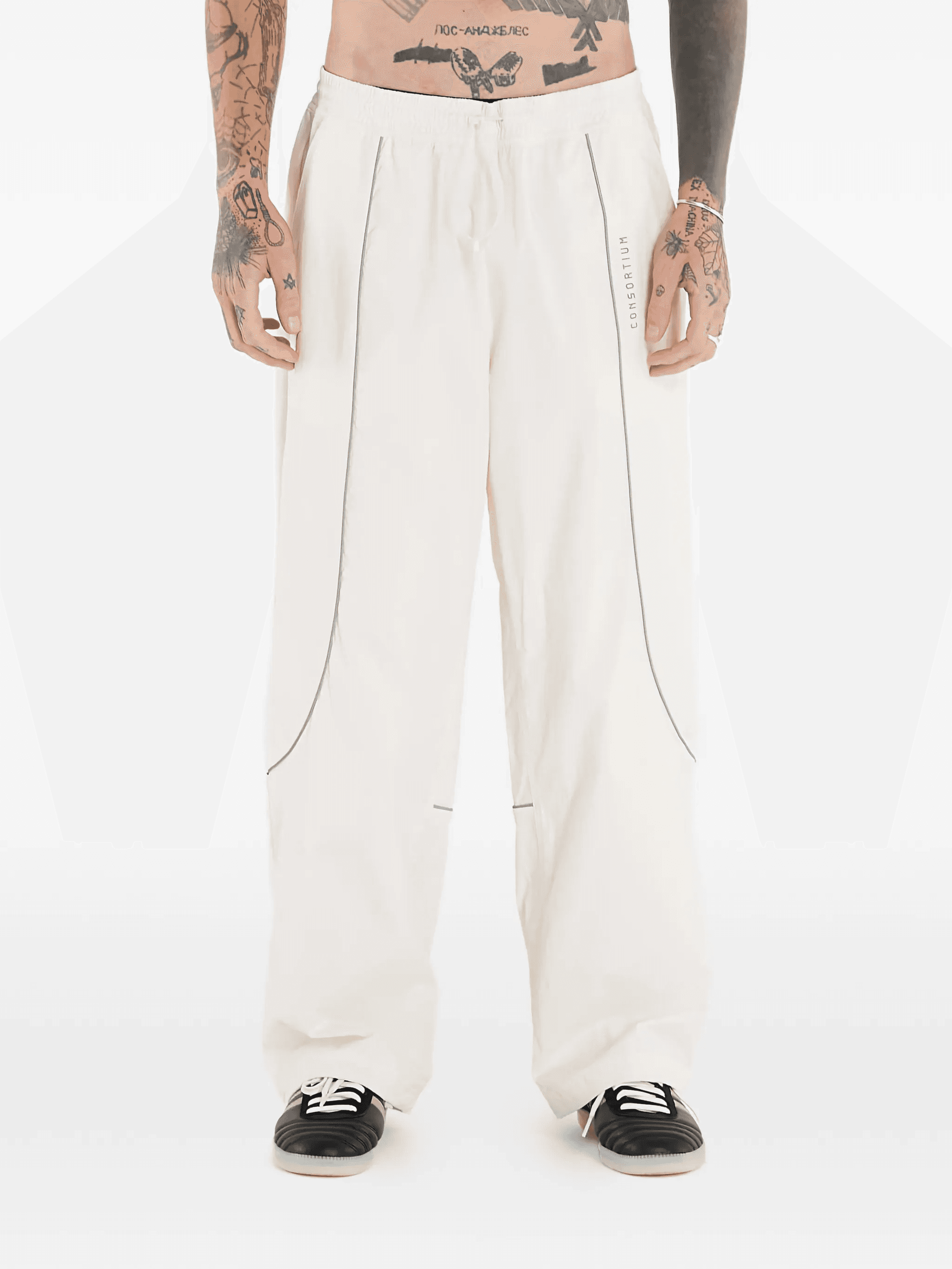 x Consortium stripe-detail track pants - Image 1